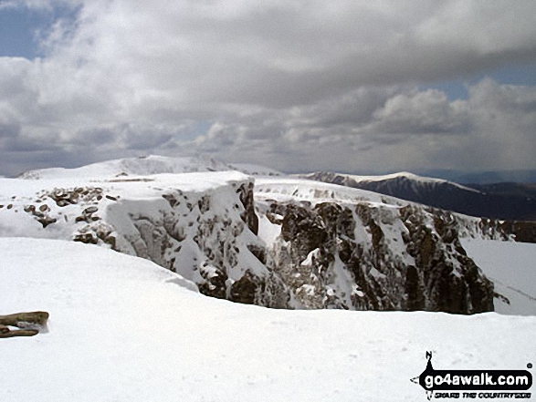 Cairn Lochan (and Braeriach (Braigh Riabhach) (left) and Sron na Lairige (right) in the distance) from Fiacaill Choire an t-Sneachda at the top of the Fiacaill Buttress Taken on a sunny and snowy 6th May, 2012