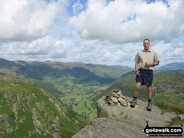 Neil, my walking chum on Eagle Crag in The Lake District Cumbria England