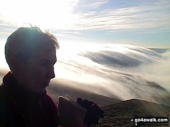 Walk wy163 Stoodley Pike and Erringden Moor from Lobb Mill - Early morning clouds rolling quickly over the edge on Stoodley Pike