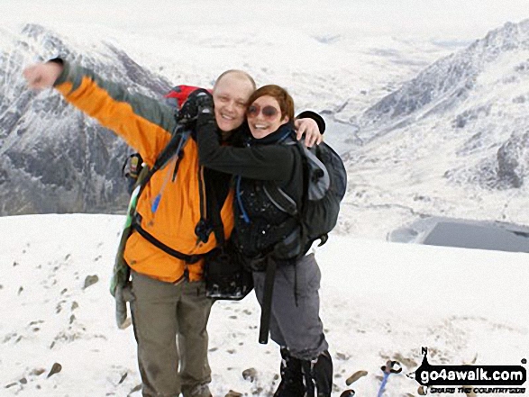 Walk gw147 Y Garn (Glyderau) from Ogwen Cottage, Llyn Ogwen - Alan and Nikki on Y Garn (Glyderau) in the snow with Pen yr Ole Wen (left) and Tryfan above Llyn Idwal (right) in the background