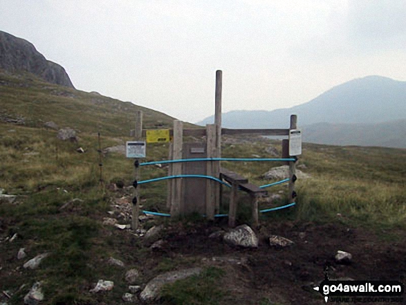 Walk c414 Crinkle Crags and Bow Fell (Bowfell) from The Old Dungeon Ghyll, Great Langdale - Stile over the electric fence near Red Tarn (Langdale)