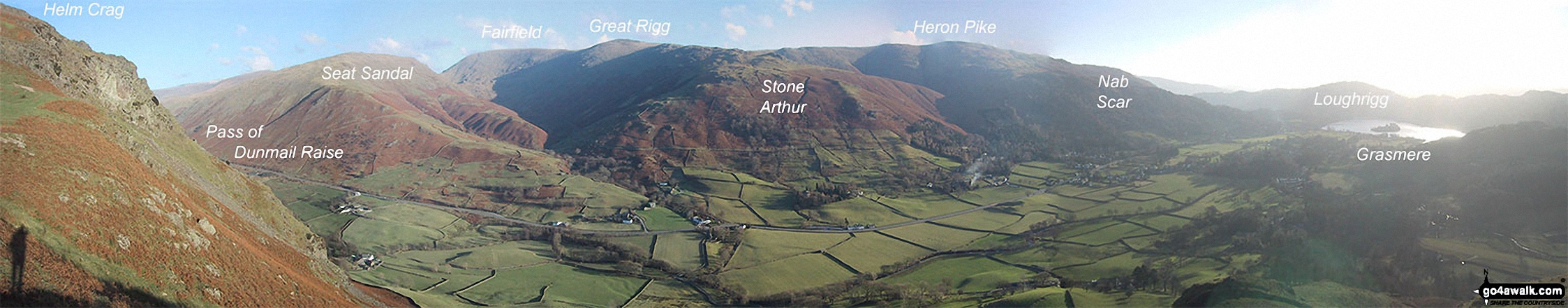 Helm Crag, Seat Sandal,  Grisedale Hause, Fairfield, Great Rigg, Stone Arthur, Heron Crag, Nab Scar, Loughrigg and Grasmere above The Pass of Dunmail Raise from the top of High Raven Crag