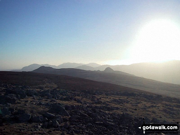 Harrison Stickle (left) and Pike of Stickle (centre right) with the Coniston Fells beyond from High Raise (Langdale)