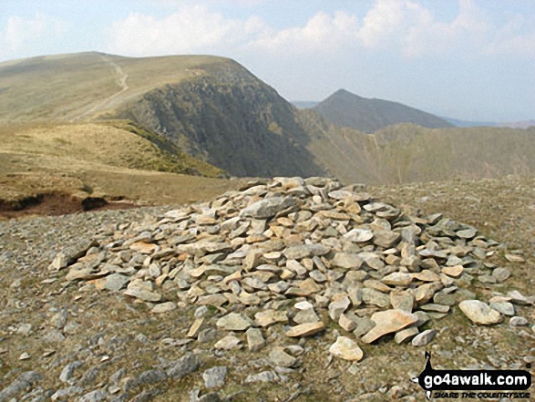 Walk c220 Helvellyn via Striding Edge from Glenridding - Nethermost Pike summit cairn with Helvellyn and Catstye Cam beyond