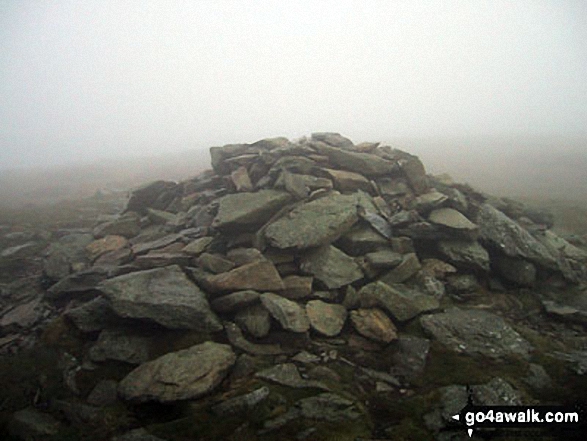 The large cairn on the summit of Moel Sych 