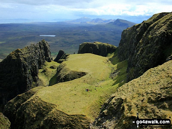 Walk h138 The Quiraing from Maoladh Mor, Isle of Skye - Looking down to The Table in The Quiraing on the lower slopes of Meall na Suiramach