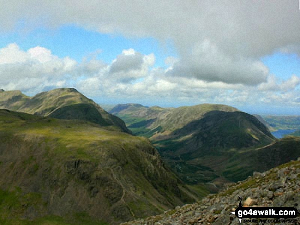 Walk c120 The Ennerdale Horseshoe - Kirk Fell (foreground), Pillar, Ennerdale, Red Pike (Buttermere), High Stile, High Crag and Crummock Water (far right) from Westmorland Cairn, Great Gable