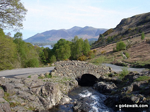 Walk c296 High Seat and Bleaberry Fell from Keswick - Ashness Bridge over Barrow Beck with Skiddaw in the distance