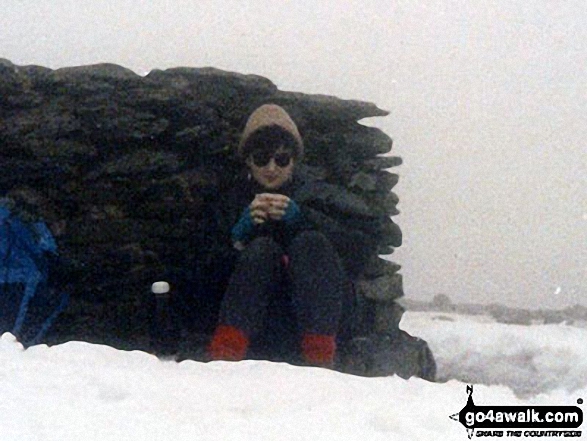 Christmas Day on top of Helvellyn This was me a 'few' years ago. We could not see very far at all. We had been up quite a few times previously so managed to find our way. I think we came back the long way as the shale would have been deadly under the snow. Needless to say, the following day we went out and bought crampons and an ice pick. Not sure why I packed the sunglasses but the cocoa was delicious!