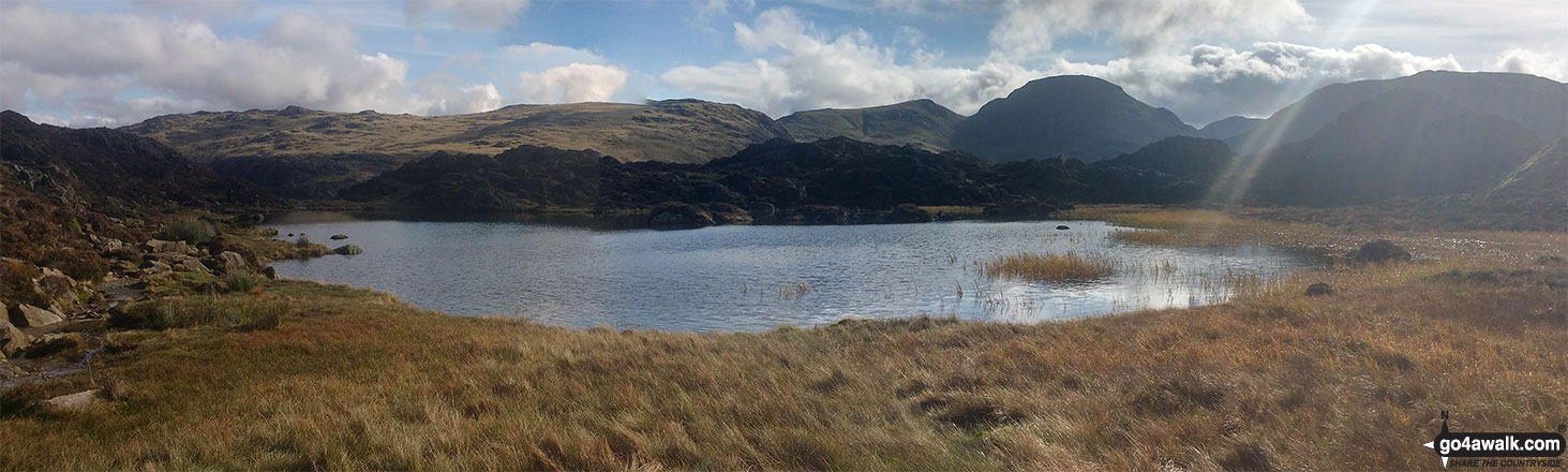 Walk c120 The Ennerdale Horseshoe - Innominate Tarn with Grey Knotts, Brandreth, Green Gable, Great Gable and Kirk Fell forming the backdrop