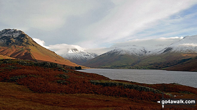 Walk c133 The Netherbeck Round from Greendale - Snow capping Yewbarrow (left) Great Gable (centre) Lingmell and Scafell Pike surround Wast Water from near Overbeck Bridge, Wasdale