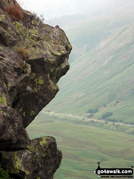 Walk c152 Calf Crag and Helm Crag from Grasmere - Looking down from Helm Crag past the Howitzer on to Dunmail Raise and the A591 Ambleside to Keswick Road