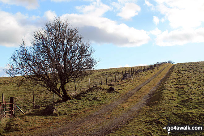 Climbing onto Longstone Moor