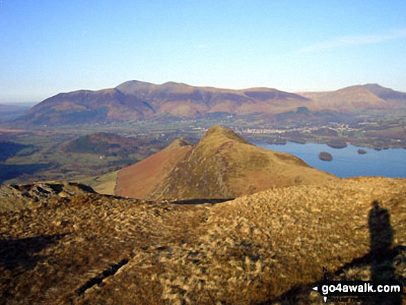 Walk c100 The Newlands Horseshoe from Hawes End - Cat Bells (Catbells) (foreground) with Derwent Water, Keswick and Skiddaw (centre left) and Blencathra (right) from Maiden Moor