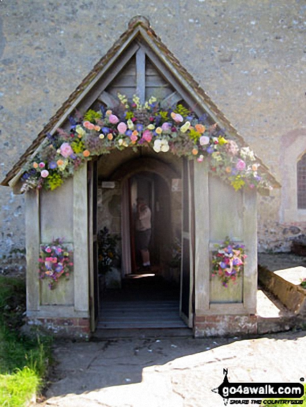 Entrance to Clayton Church bedecked in flowers 