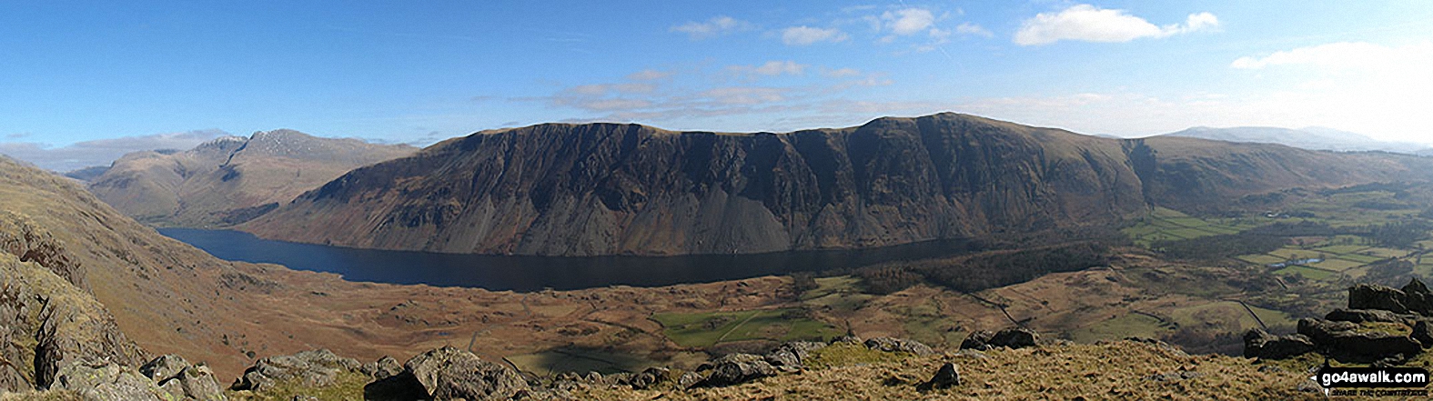 Walk c328 The Greendale Horseshoe - Wast Water with the Scafel Massive (far left- featuring Ling Mell, Great End, Broad Crag, Ill Crag, Scafell Pike, Symonds Knott and Sca Fell) and Illgill Head (centre) and Whin Rigg (centre right) above the Wast Water screes from Buckbarrow