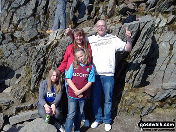 Walk gw136 The Snowdon (Yr Wyddfa) Horseshoe from Pen y Pass - Me, my fella and two of the kids at the top of Snowdon