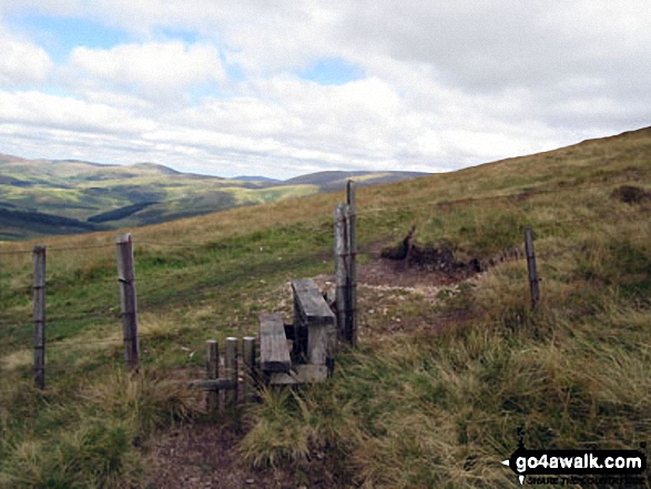 Walk n157 Swineside Law and Windy Gyle from Wedder Leap, Barrowburn - Stile over the border fence between England and Scotland on the way to Windy Gyle