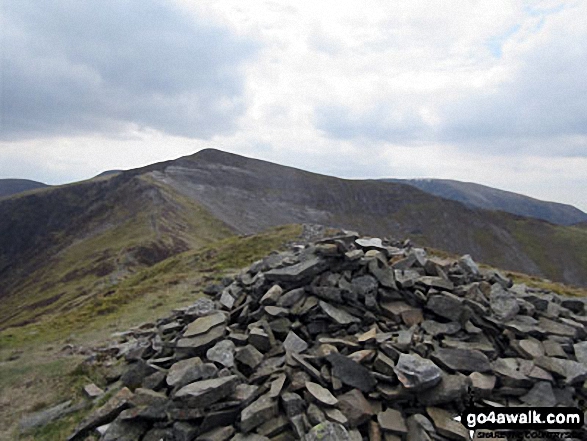 Walk c169 Grisedale Pike and Hopegill Head from Whinlatter Forest - Ladyside Pike summit cairn with Hopegill Head (centre left) and Grasmoor (right) in the background