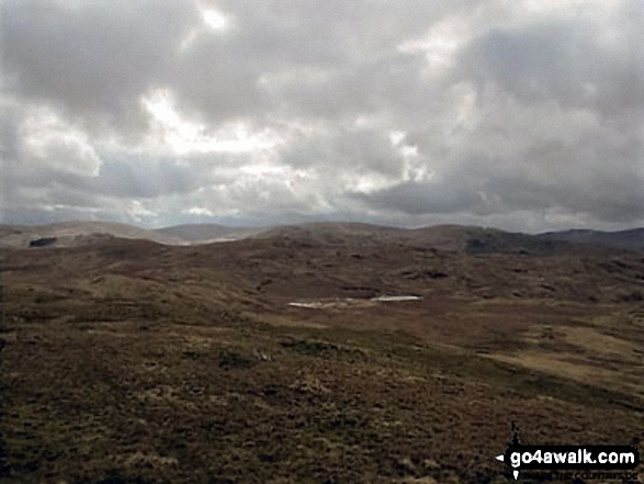 Walk c465 High Wether Howe, Seat Robert and Great Ladstones from Wet Sleddale Reservoir - Haskew Tarn with High Wether Howe beyond from Seat Robert