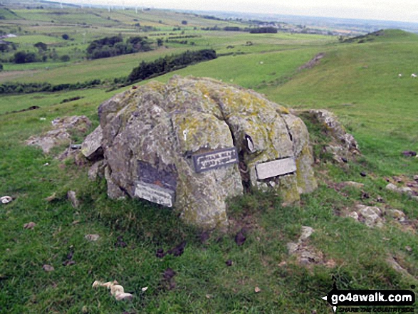 Walk c493 St Johns Hill and Caermote Hill from Bothel - The boulder with memorial plaques on Caermote Hill summit