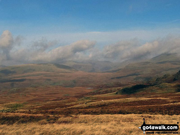 Walk c205 Green Crag (Ulpha Fell) and Great Worm Crag from Stanley Force NT Car Park, Eskdale - Clouds over the higher fells looking back towards Boot from Great Worm Crag