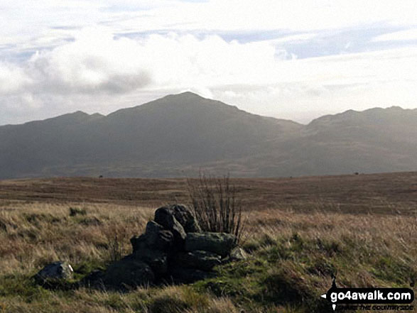 Smaller and slightly higher summit cairn on Great Worm Crag with Caw (Dunnerdale Fells) in the distance