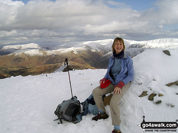 Walk c389 Great Rigg, Fairfield and Hart Crag from Ambleside - Sitting on Dove Crag summit cairn in the snow