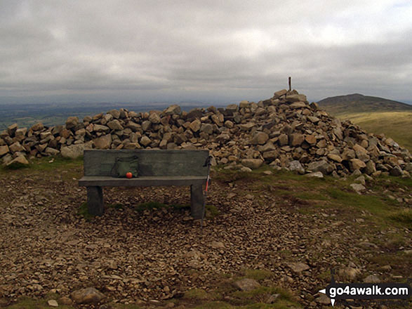 The cairn and bench on the summit of High Pike (Caldbeck)