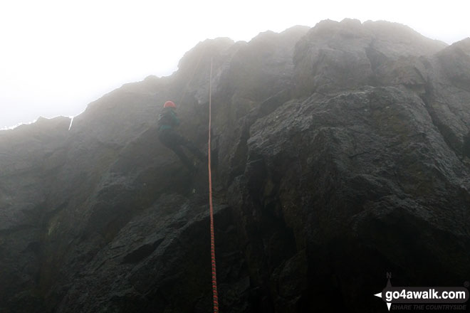 Abseiling off Pillar Rock