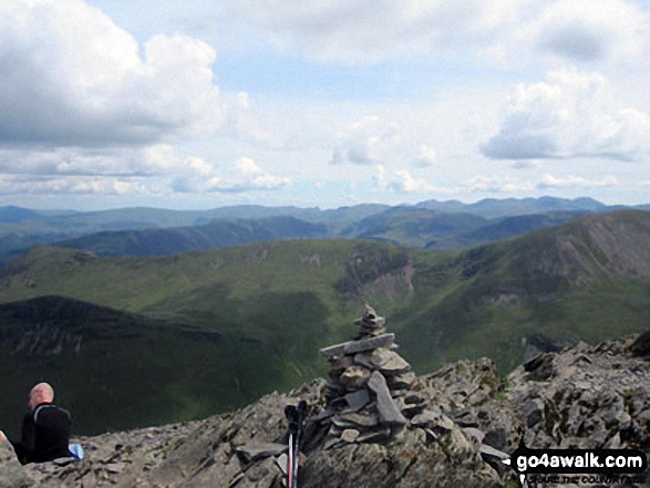 Walk c137 The Coldale Round from Braithwaite - Outerside (foreground in shadow), Causey Pike, Coledale Hause and Crag Hill (Eel Crag) in the mid-distance with The Newlands Fells beyond from the summit cairn on Grisedale Pike