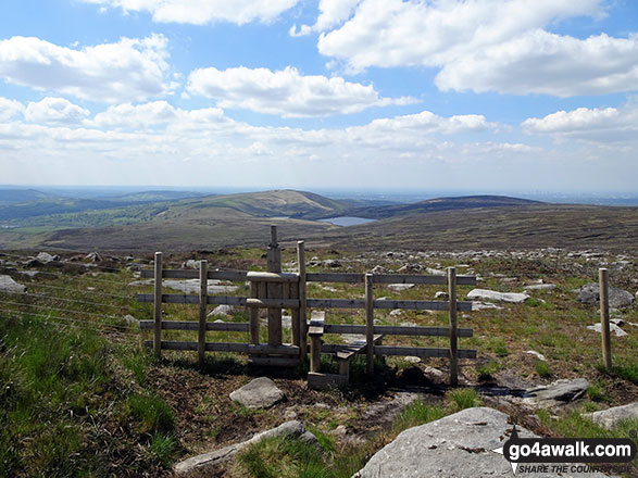 The view from Windgate Edge with Dove Stone Reservoir and Dick Hill in the distance