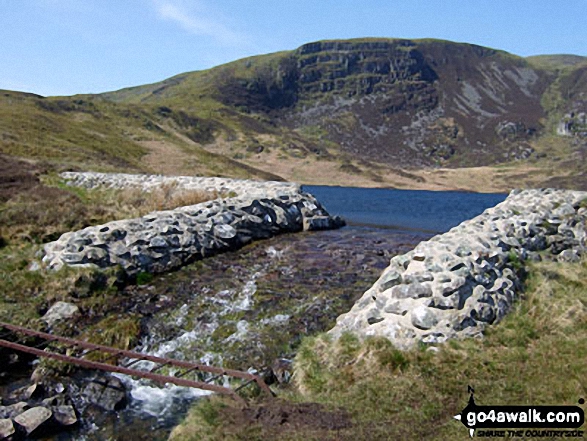 Llyn Arenig Fawr Dam outflow with Arenig Fawr (Moel Yr Eglwys) itself in the background 