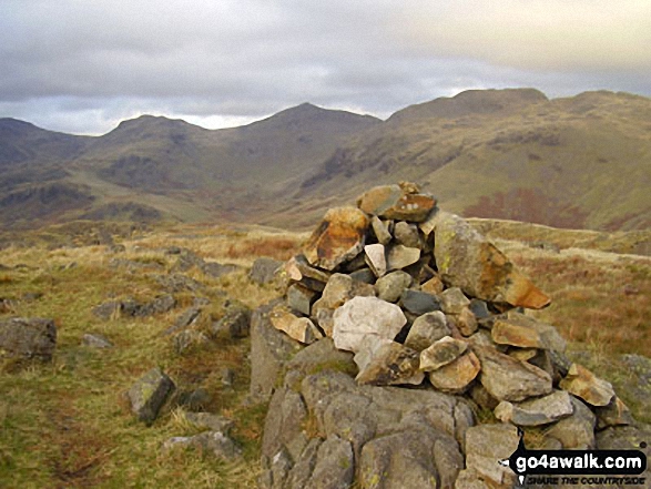 Walk c402 Harter Fell and Hard Knott from The Woolpack Inn, Eskdale - Hard Knott summit cairn - with Esk Pike, Bow Fell (Bowfell) and Crinkle Crags gracing the skyline