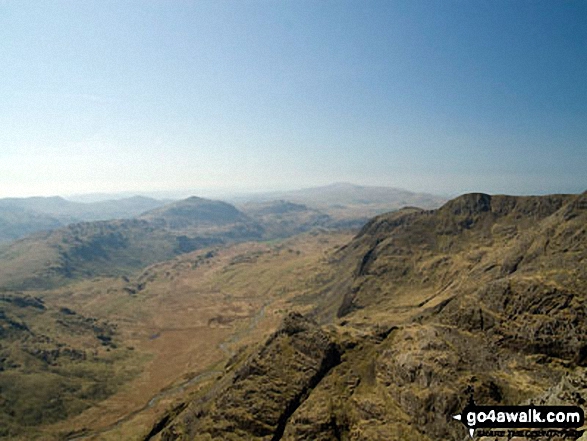 Walk c453 The Scafell Mountains from Wasdale Head, Wast Water - Harter Fell (Eskdale) (centre left), Cam Spout Crag and Slight Side (centre right) with Eskdale below from Ill Crag summit