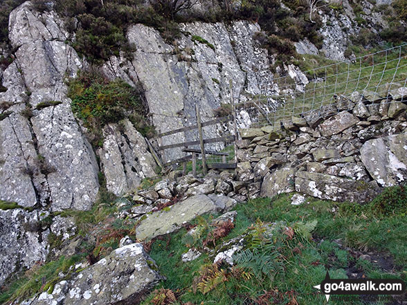 Walk c212 Burnbank Fell, Gavel Fell, Hen Comb and Mellbreak from Loweswater - Wonky stile on the route up Eagle Crag