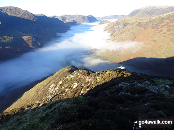 Looking down Fleetwith Edge to a cloud inversion in the Buttermere valley from Fleetwith Pike