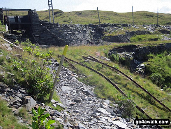 Drum House (with the drum and cable still attached) and rails on the disused incline at the top of Maen-offeren Quarry, Blaenau Ffestiniog 