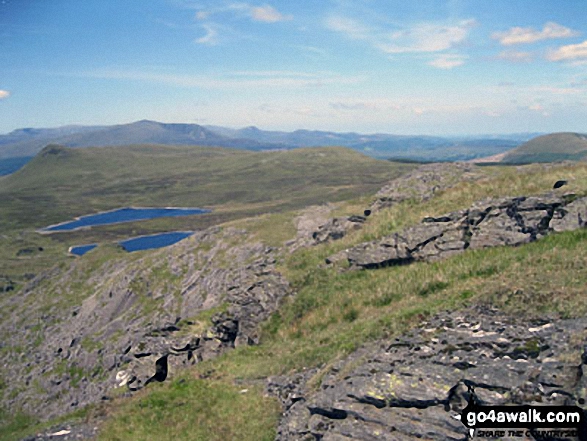 The Carneddau & Carnedd Moel Siabod (on horizon), Moel Penamnen (left) and Llyn Newydd & Llyn Bowydd (mid distance ) from Manod Mawr (North Top)