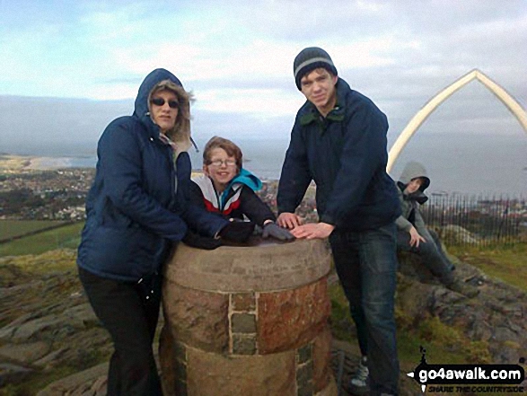 My family on a windy day on North Berwick Law east of  Edinburgh 