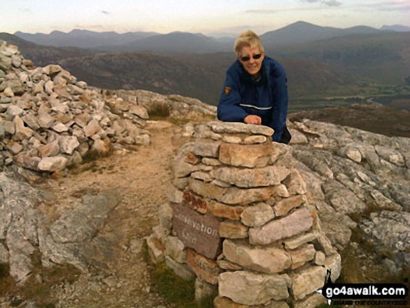 On Spidean Coire nan Clach (Beinn Eighe) summit Ali, my better half, is scared of heights, but braved the trail cut into the glacial slope to reach our first peak in Scotland. So windy at the top you could barely stand up but the view was stunning and well worth it. Well be back for more peaks as soon as possible.