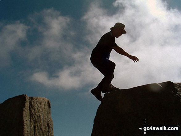 Leaping across Adam and Eve - the two large stones on the summit of Tryfan