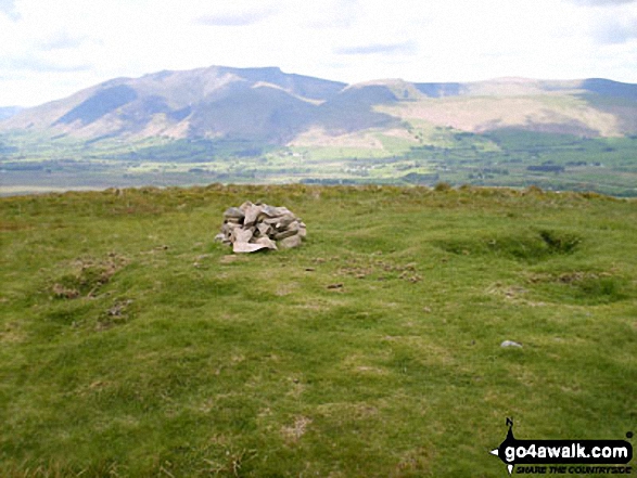 Walk c309 Great Mell Fell, Little Mell Fell and Gowbarrow Fell - Great Mell Fell summit cairn - with Blencathra (or Saddleback) in the background