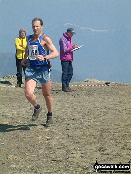 Walk c313 The Newlands Fells from Hawes End - Anniversary Waltz Fell Race leader on Robinson summit