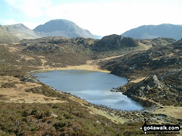 Walk c120 The Ennerdale Horseshoe - Blackbeck Tarn on Hay Stacks with Great Gable beyond