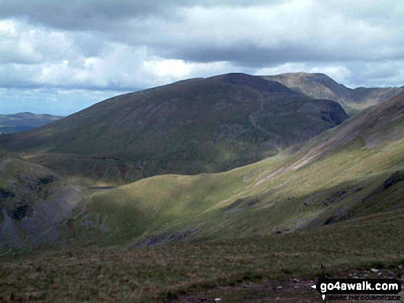 Walk c247 The Fairfield Horseshoe from Ambleside - Grisedale Hause, Dollywaggon Pike (centre), Nethermost Pike, Helvellyn and Striding Edge (far right) from Great Rigg