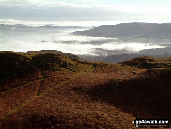 Walk c232 Loughrigg Fell from Ambleside - Mist over Windermere from Loughrigg Fell summit