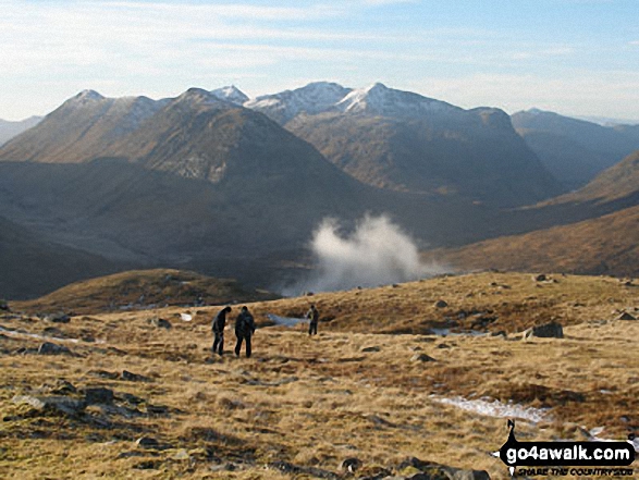 The Three Sisters of Glen Coe (snow capped) and Buachaille Etive Beag (left) from the lower slopes of Beinn a' Chrulaiste 