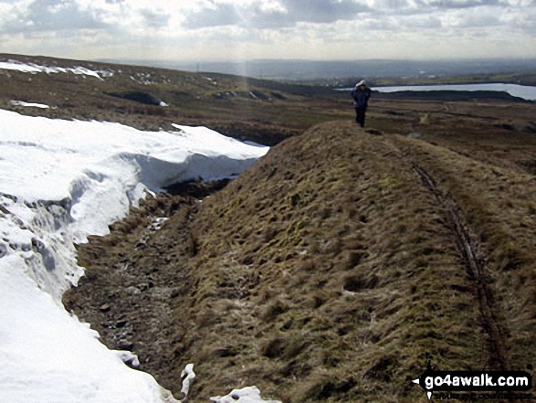 On Ramsden Road (track) near Rough Hill (Shore Moor) with Watergrove Reservoir in the distance 