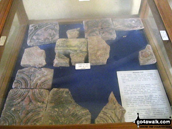 Walk s226 Blore, Ilam, The River Manifold and The River Dove from Mappleton (aka Mapleton) - Display case containing medieval tiles inside St. Bartholomew's Church, Blore